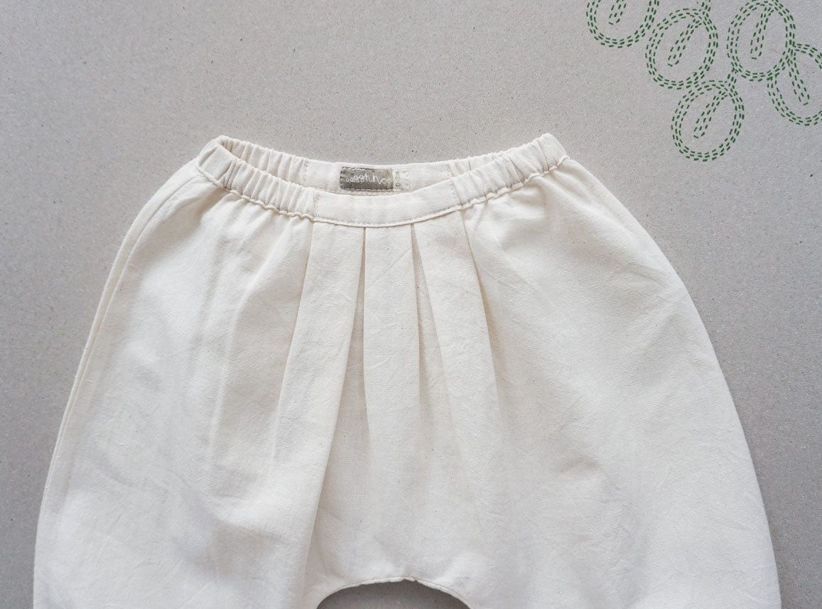 Pale Ivory Pleated Pants