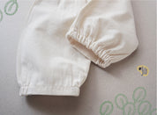 Pale Ivory Pleated Pants