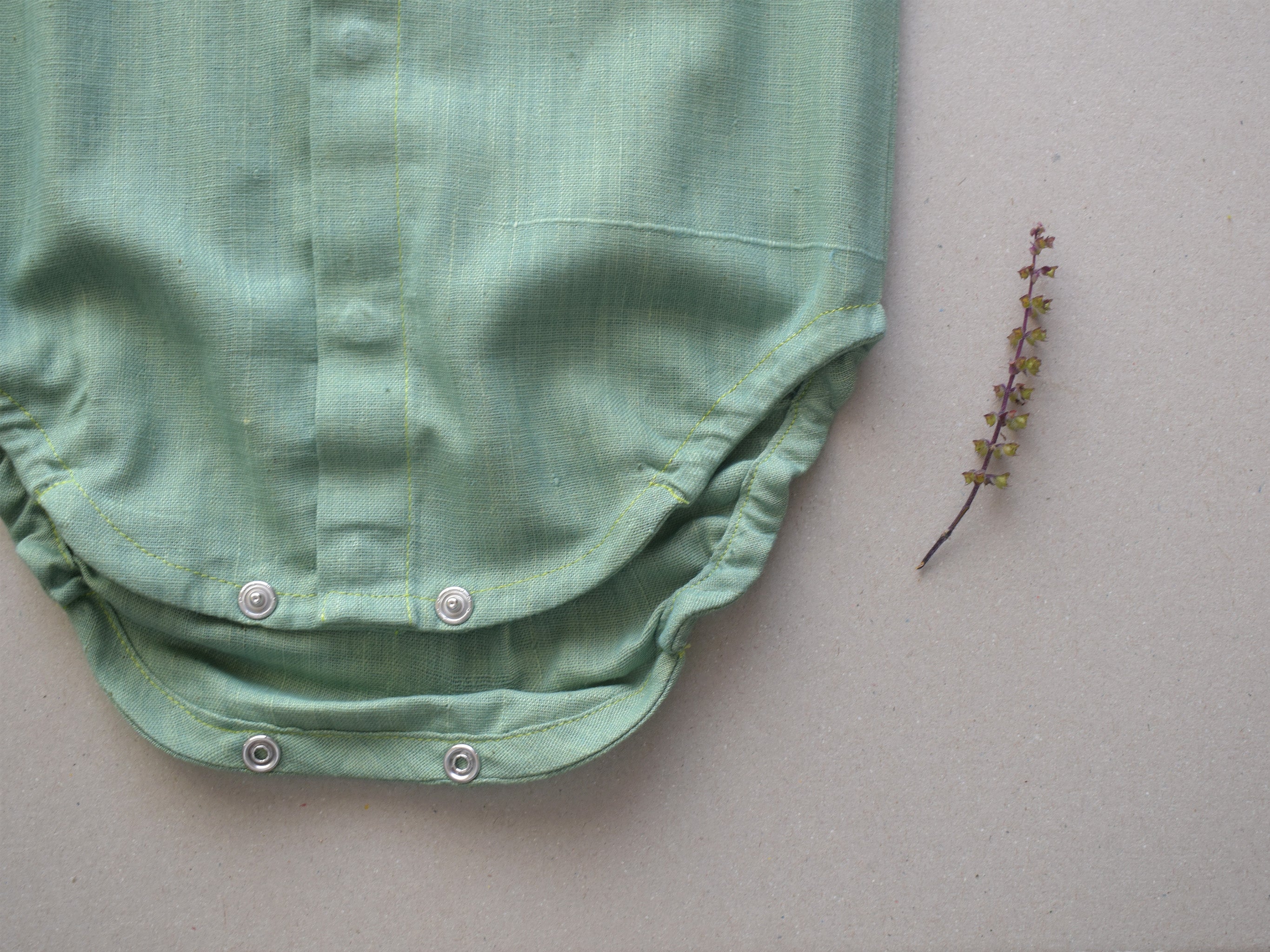Mossgreensleevelessbabyonesie2.jpg
